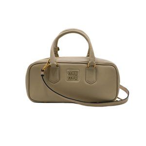 13117 - Miu Miu Leather Barrel Handbag Beige
